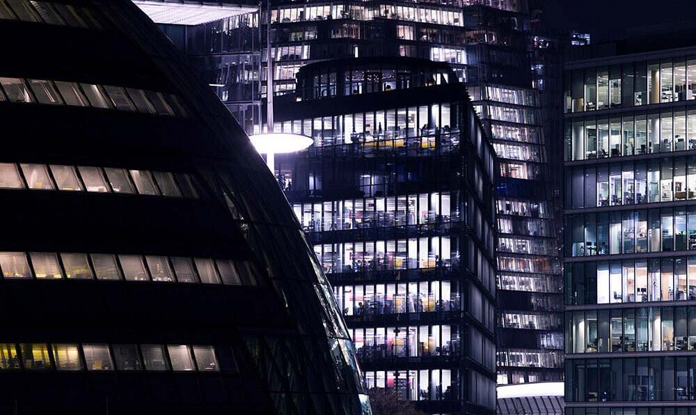 Exterior of high rise office buildings at night